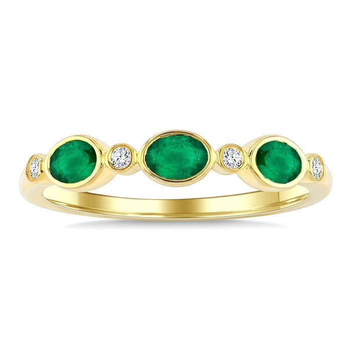4X3 MM Oval Shape Emerald and 1/20 Ctw Bezel Set Round Cut Diamond Precious Fashion Band in 10K Yellow Gold