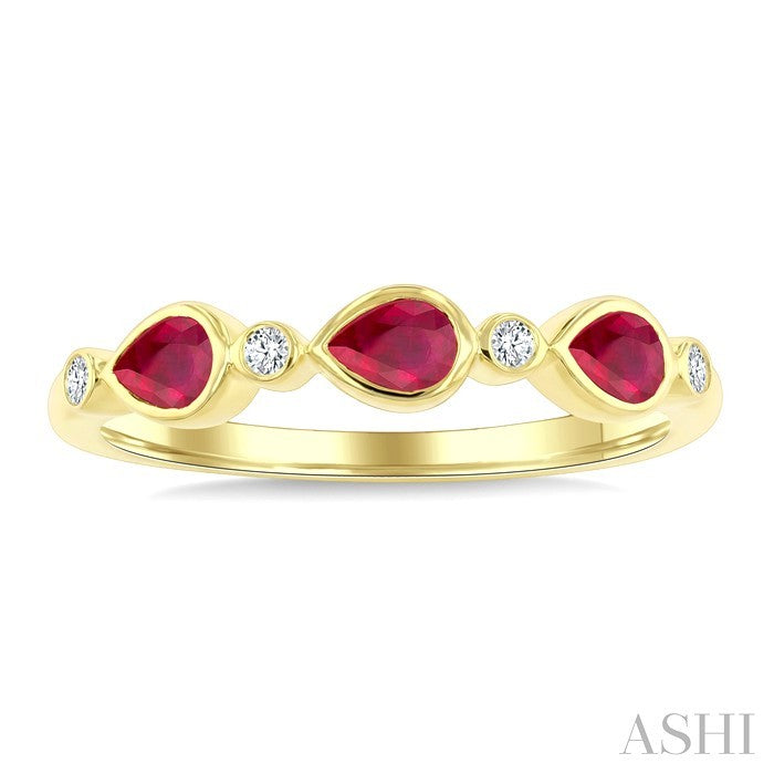 4X3 MM Pear Shape Ruby and 1/20 Ctw Bezel Set Round Cut Diamond Precious Fashion Band in 10K Yellow Gold
