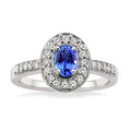 6x4mm Oval Cut Tanzanite and 1/4 Ctw Round Cut Diamond Ring in 14K White Gold