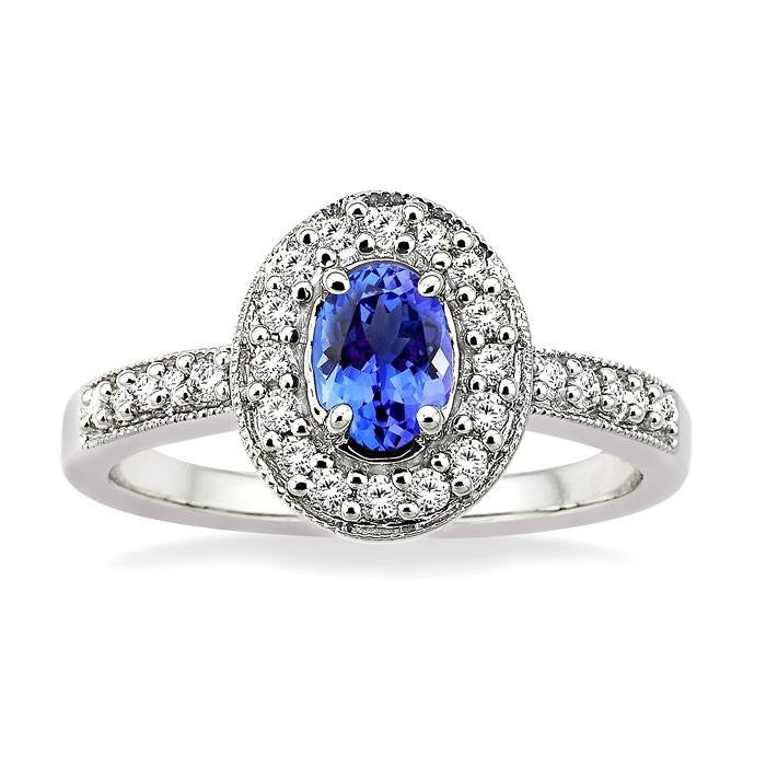 6x4mm Oval Cut Tanzanite and 1/4 Ctw Round Cut Diamond Ring in 14K White Gold
