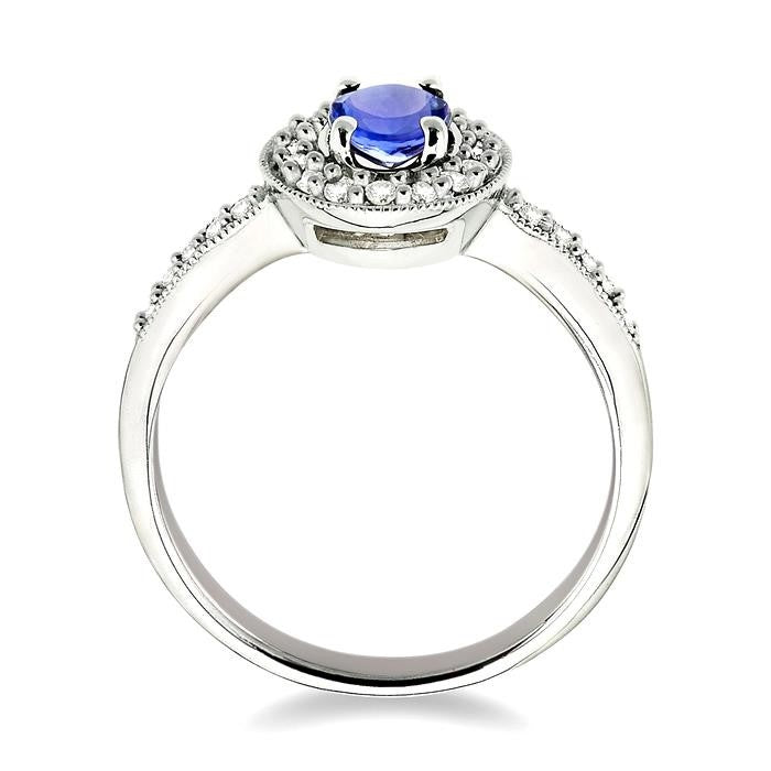 6x4mm Oval Cut Tanzanite and 1/4 Ctw Round Cut Diamond Ring in 14K White Gold