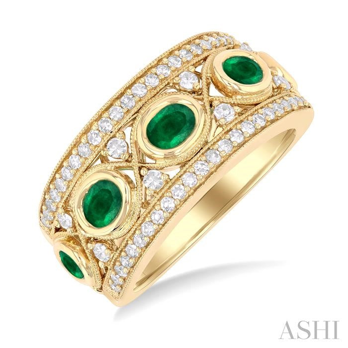 4x3 MM Oval and 2.8 MM Round Cut Emerald and 3/8 Ctw Curvy Criss Cross Round Cut Diamond Precious Band in 14K Yellow Gold