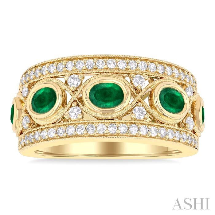 4x3 MM Oval and 2.8 MM Round Cut Emerald and 3/8 Ctw Curvy Criss Cross Round Cut Diamond Precious Band in 14K Yellow Gold