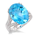 16x12 MM Oval Cut Blue Topaz and 1/4 Ctw Round Cut Diamond Semi-Precious Ring in 14K White Gold