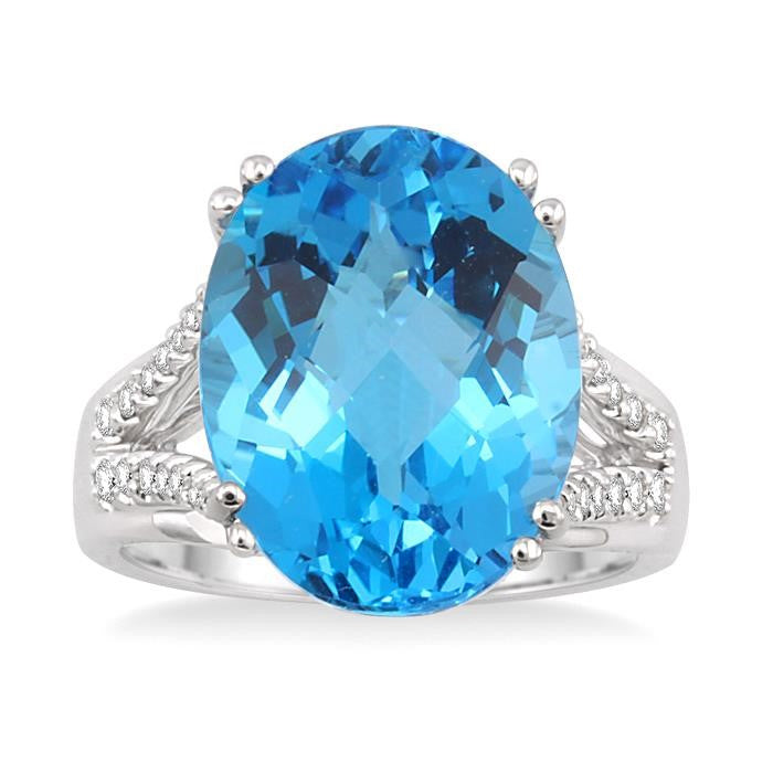 16x12 MM Oval Cut Blue Topaz and 1/4 Ctw Round Cut Diamond Semi-Precious Ring in 14K White Gold