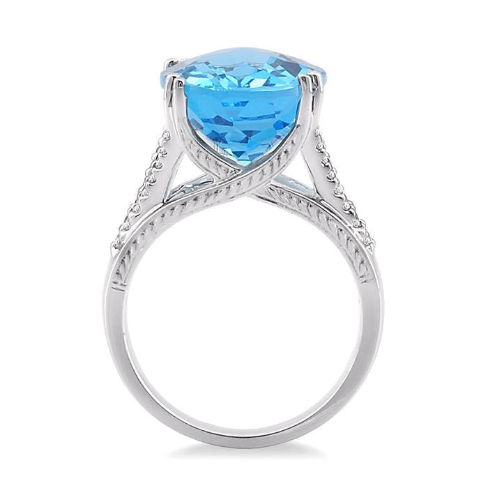 16x12 MM Oval Cut Blue Topaz and 1/4 Ctw Round Cut Diamond Semi-Precious Ring in 14K White Gold