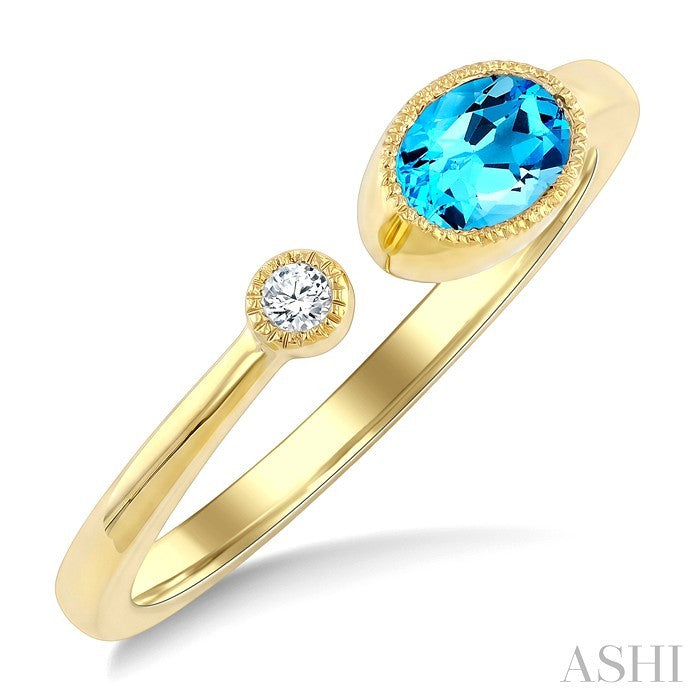 6X4 MM Oval Cut Blue Topaz and 1/50 Ctw Round Cut Diamond Semi-Precious Open Ring in 10K Yellow Gold