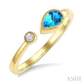 6X4 MM Pear Cut Blue Topaz and 1/50 Ctw Round Cut Diamond Semi-Precious Open Ring in 10K Yellow Gold