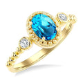 7X5 MM Oval Cut Blue Topaz and 1/20 Ctw Round Cut Diamond Semi-Precious Beaded Ring in 10K Yellow Gold