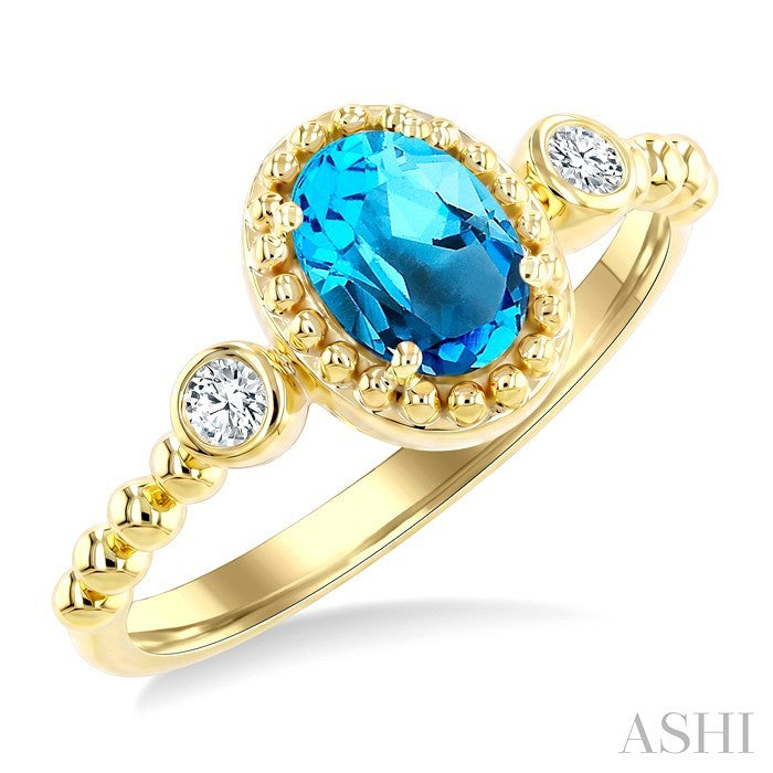 7X5 MM Oval Cut Blue Topaz and 1/20 Ctw Round Cut Diamond Semi-Precious Beaded Ring in 10K Yellow Gold