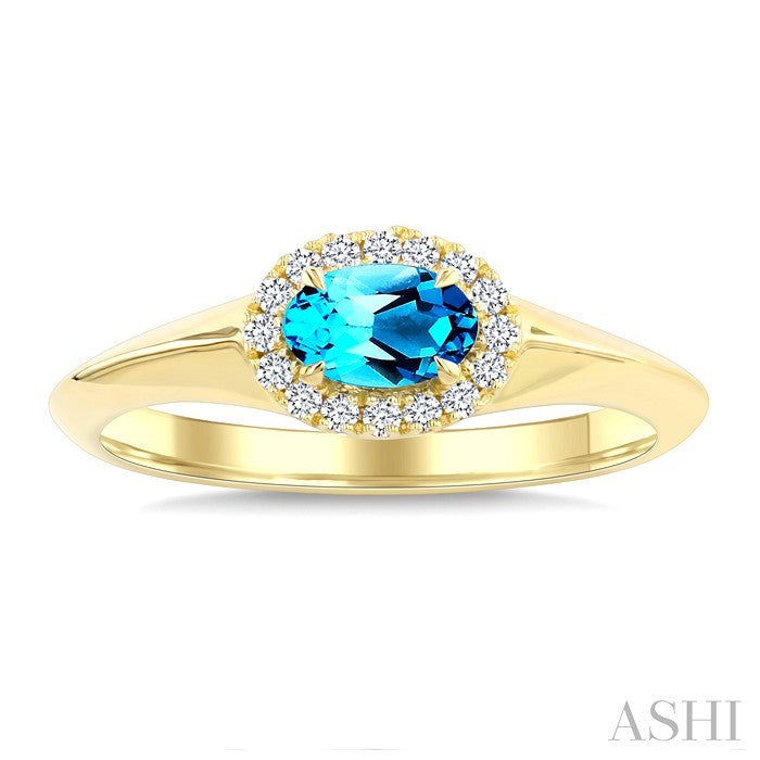 6X4 MM Oval Cut Blue Topaz and 1/8 Ctw Round Cut Diamond Semi-Precious Halo Ring in 10K Yellow Gold