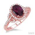 8x6MM Oval Cut Rhodolite Garnet and 1/3 Ctw Round Cut Diamond Ring in 14K Rose Gold