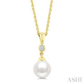 7 MM White Cultured Pearl and 1/20 Ctw Round Cut Diamond Pendant With Chain in 10K Yellow Gold