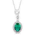 6x4 MM Oval Cut Emerald and 1/10 Ctw Round Cut Diamond Pendant in 10K White Gold with Chain