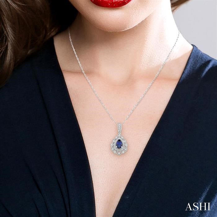 6x4 MM Pear Cut Sapphire and 1/8 Ctw Lattice Round Cut Diamond Precious Pendant With Chain in 10K White Gold