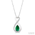 6X4 MM Pear Cut Emerald and 1/10 Ctw Eternity Round Cut Diamond Precious Pendant With Chain in 10K White Gold