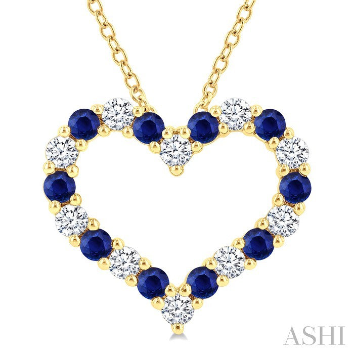 2.3 MM Round Cut Sapphire and 1/2 Ctw Open Heart Round Cut Diamond Precious Fashion Pendant With Chain in 14K Yellow Gold