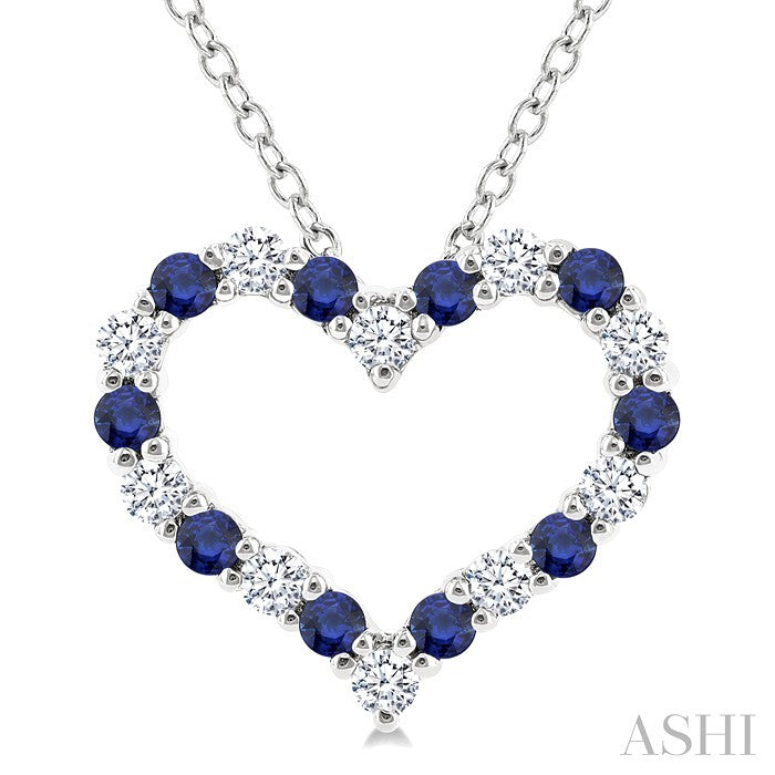 1.4 MM Round Cut Sapphire and 1/8 Ctw Open Heart Round Cut Diamond Precious Fashion Pendant With Chain in 14K White Gold