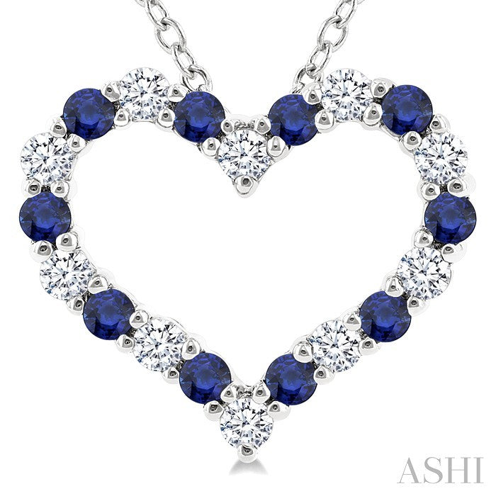 1.4 MM Round Cut Sapphire and 1/8 Ctw Open Heart Round Cut Diamond Precious Fashion Pendant With Chain in 14K White Gold