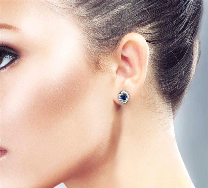 4x3 MM Oval Shaped Sapphire and 1/10 Ctw Round Cut Diamond Earrings in 14K White Gold
