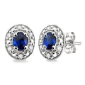 4X3 MM Oval Shaped Sapphire and 1/10 Ctw Round Cut Diamond Earrings in 10K White Gold