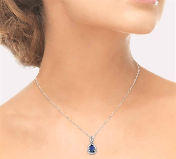 6x4 MM Pear Shape Sapphire and 1/10 Ctw Round Cut Diamond Pendant in 14K White Gold with Chain