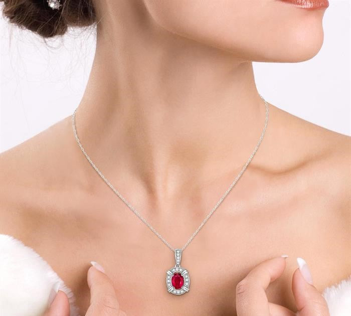 6x4 MM Oval Cut Ruby and 1/10 Ctw Round Cut Diamond Pendant in 14K White Gold with Chain