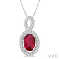 6x4 MM Oval Cut Ruby and 1/10 Ctw Round Cut Diamond Pendant in 14K White Gold with Chain