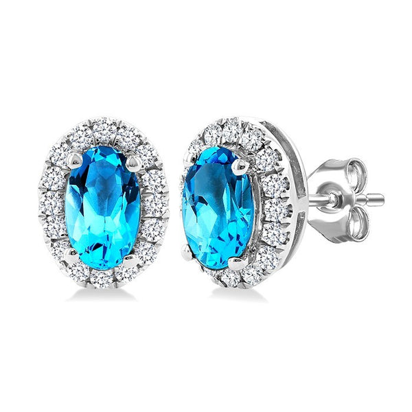 5x3 MM Oval Shape Blue Topaz and 1/8 Ctw Round Cut Diamond Halo Semi-Precious Stud Earrings in 14K White Gold