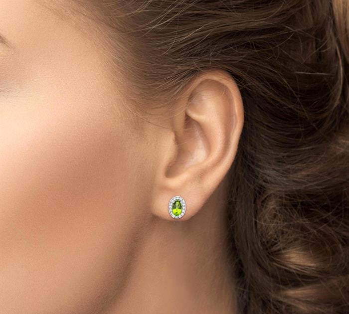 5x3 MM Oval Shape Peridot and 1/8 Ctw Round Cut Diamond Halo Semi-Precious Stud Earrings in 10K White Gold