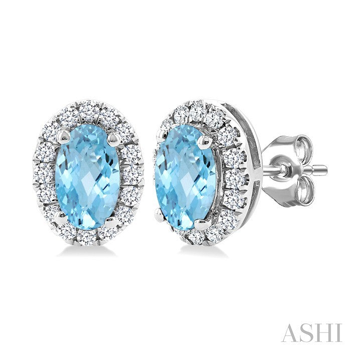 5x3 MM Oval Shape Aquamarine and 1/8 Ctw Round Cut Diamond Halo Semi-Precious Stud Earrings in 14K White Gold