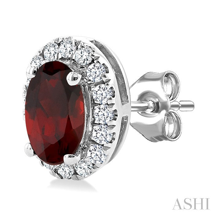 5x3 MM Oval Shape Garnet and 1/8 Ctw Round Cut Diamond Halo Semi-Precious Stud Earrings in 14K White Gold