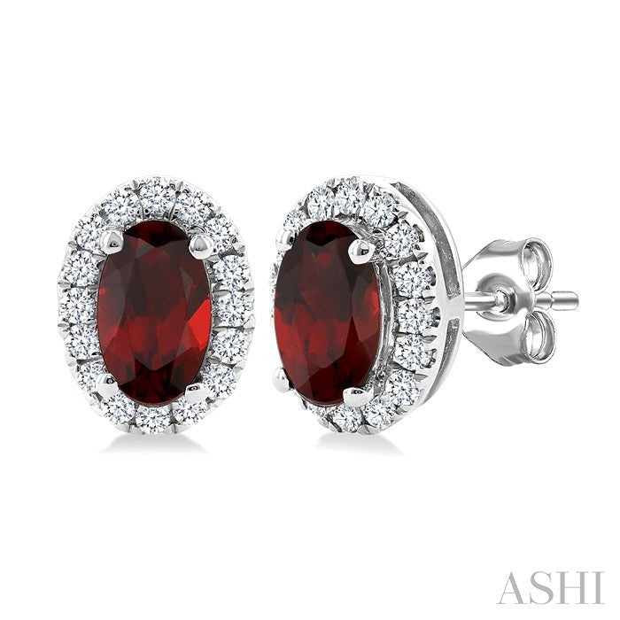 5x3 MM Oval Shape Garnet and 1/8 Ctw Round Cut Diamond Halo Semi-Precious Stud Earrings in 14K White Gold