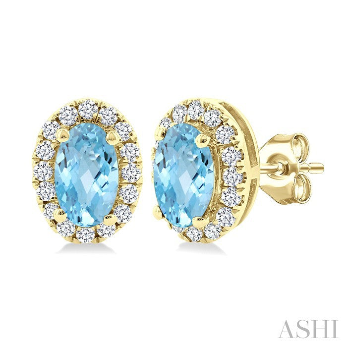 5x3 MM Oval Shape Aquamarine and 1/8 Ctw Round Cut Diamond Halo Semi-Precious Stud Earrings in 10K Yellow Gold