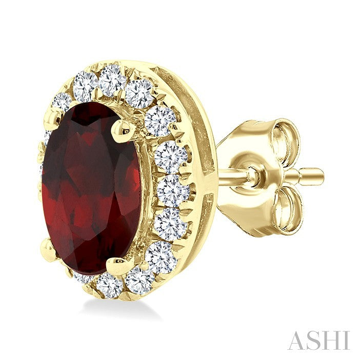 5x3 MM Oval Shape Garnet and 1/8 Ctw Round Cut Diamond Halo Semi-Precious Stud Earrings in 10K Yellow Gold