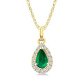 5x3 MM Pear Shape Emerald and 1/20 Ctw Round Cut Diamond Halo Precious Pendant with Chain in 10K Yellow Gold
