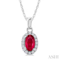 5x3 MM Oval Shape Ruby and 1/20 Ctw Round Cut Diamond Halo Precious Pendant with Chain in 14K White Gold