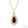 5x3 MM Pear Shape Garnet and 1/20 Ctw Round Cut Diamond Halo Semi-Precious Pendant with Chain in 10K Yellow Gold
