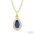 5x3 MM Pear Shape Sapphire and 1/20 Ctw Round Cut Diamond Halo Precious Pendant with Chain in 10K Yellow Gold