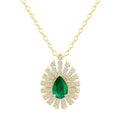 1/3 Ctw Starburst 6X4MM Pear Cut Emerald and Round Cut Diamond Precious Pendant With Chain in 14K Yellow Gold