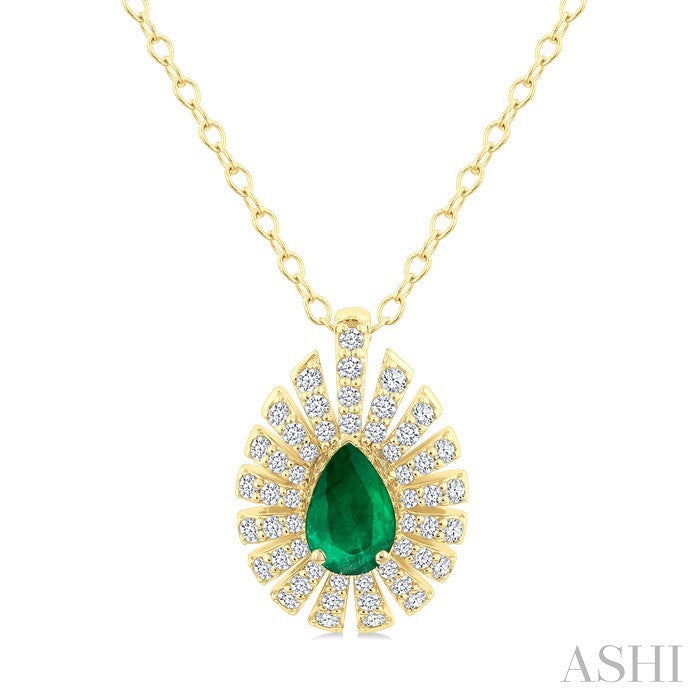 1/3 Ctw Starburst 6X4MM Pear Cut Emerald and Round Cut Diamond Precious Pendant With Chain in 14K Yellow Gold