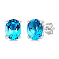4X3 MM Oval Shape Blue Topaz Semi-Precious Stud Earrings in 10K White Gold