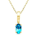 5X3 MM Oval Shape Blue Topaz Semi-Precious Solitaire Pendant With Chain in 10K Yellow Gold