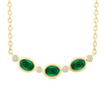 4X3MM Oval Cut Emerald and 1/50 Ctw Bezel Set Round Cut Diamond Precious Fashion Necklace in 10K Yellow Gold