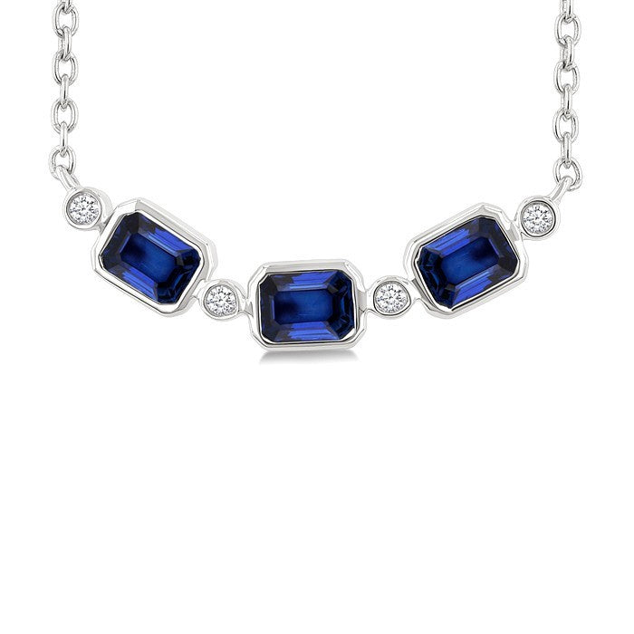 4X3MM Emerald Cut Sapphire and 1/50 Ctw Bezel Set Round Cut Diamond Precious Fashion Necklace in 10K White Gold