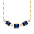 4X3MM Emerald Cut Sapphire and 1/50 Ctw Bezel Set Round Cut Diamond Precious Fashion Necklace in 10K Yellow Gold
