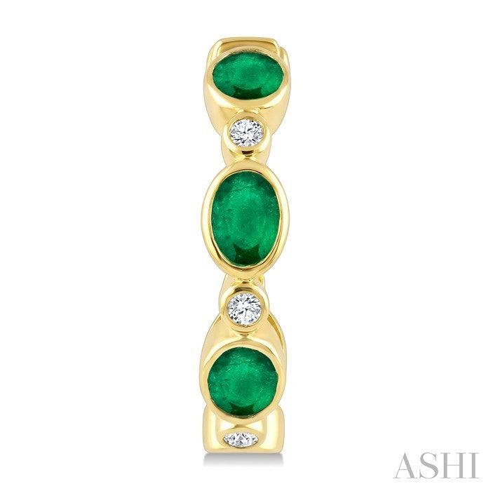 4X3 MM Oval Shape Emerald and 1/20 Ctw Bezel Set Round Cut Diamond Fashion Hoop Earrings in 10K Yellow Gold