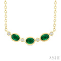 4X3MM Oval Cut Emerald and 1/50 Ctw Bezel Set Round Cut Diamond Precious Fashion Necklace in 10K Yellow Gold
