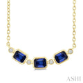 4X3MM Emerald Cut Sapphire and 1/50 Ctw Bezel Set Round Cut Diamond Precious Fashion Necklace in 10K Yellow Gold