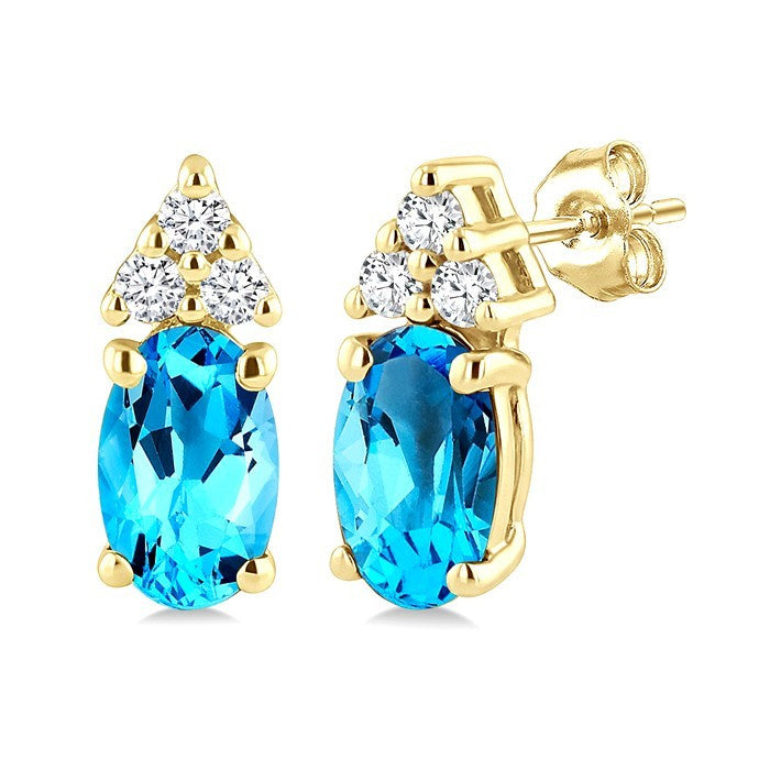 1/20 Ctw Oval Cut 5X3 MM Blue Topaz and Round Cut Diamond semi-precious Earrings in 14K Yellow Gold